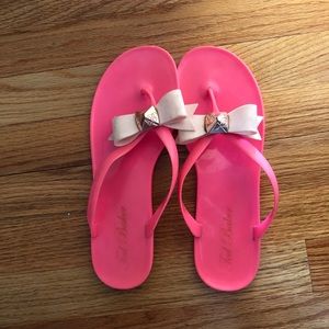 pink bow flip flops